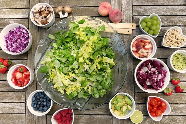 Colourful bird food mix in wooden bowl