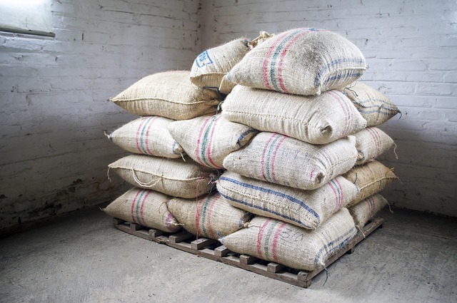 Large sacks of bird food stacked neatly