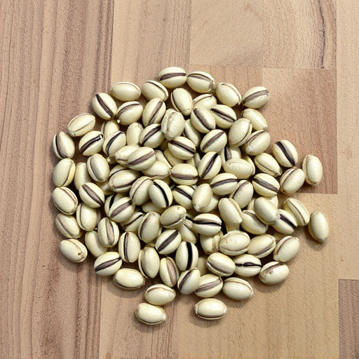 Striped sunflower seeds on wooden table