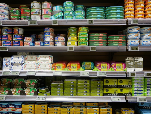 Discounted bird food stacked in store