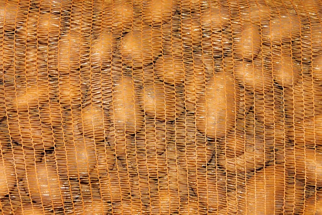Large sacks of bird food stacked neatly
