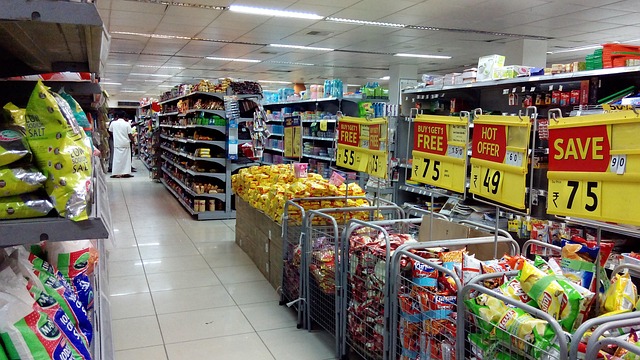 Shopper comparing bird seed prices