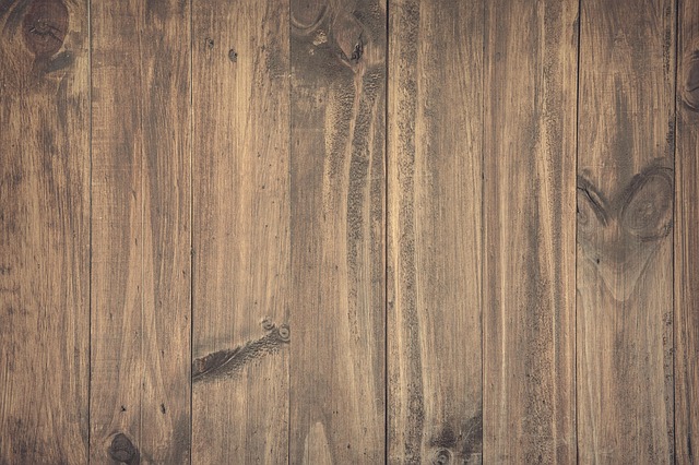 Sunflower hearts spilling onto wooden surface