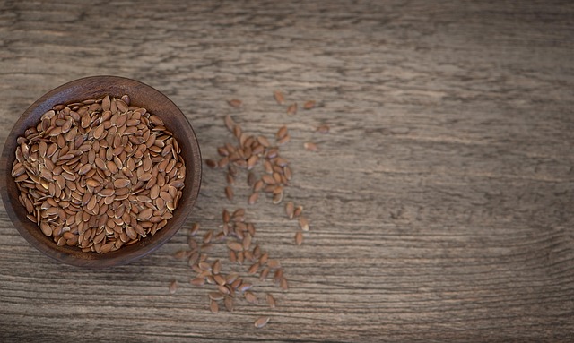 Variety of seeds in wooden bowl