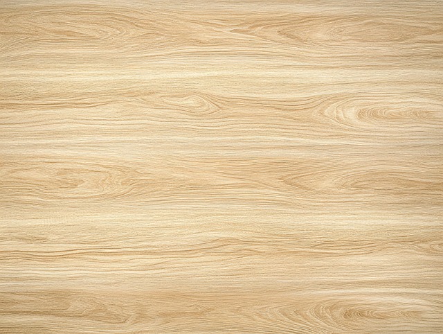 Sunflower hearts spilling onto wooden surface